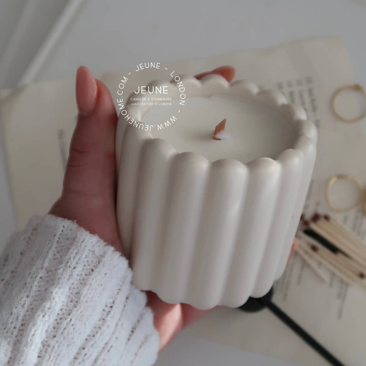 Fluted coconut wax candle in handcrafted jar