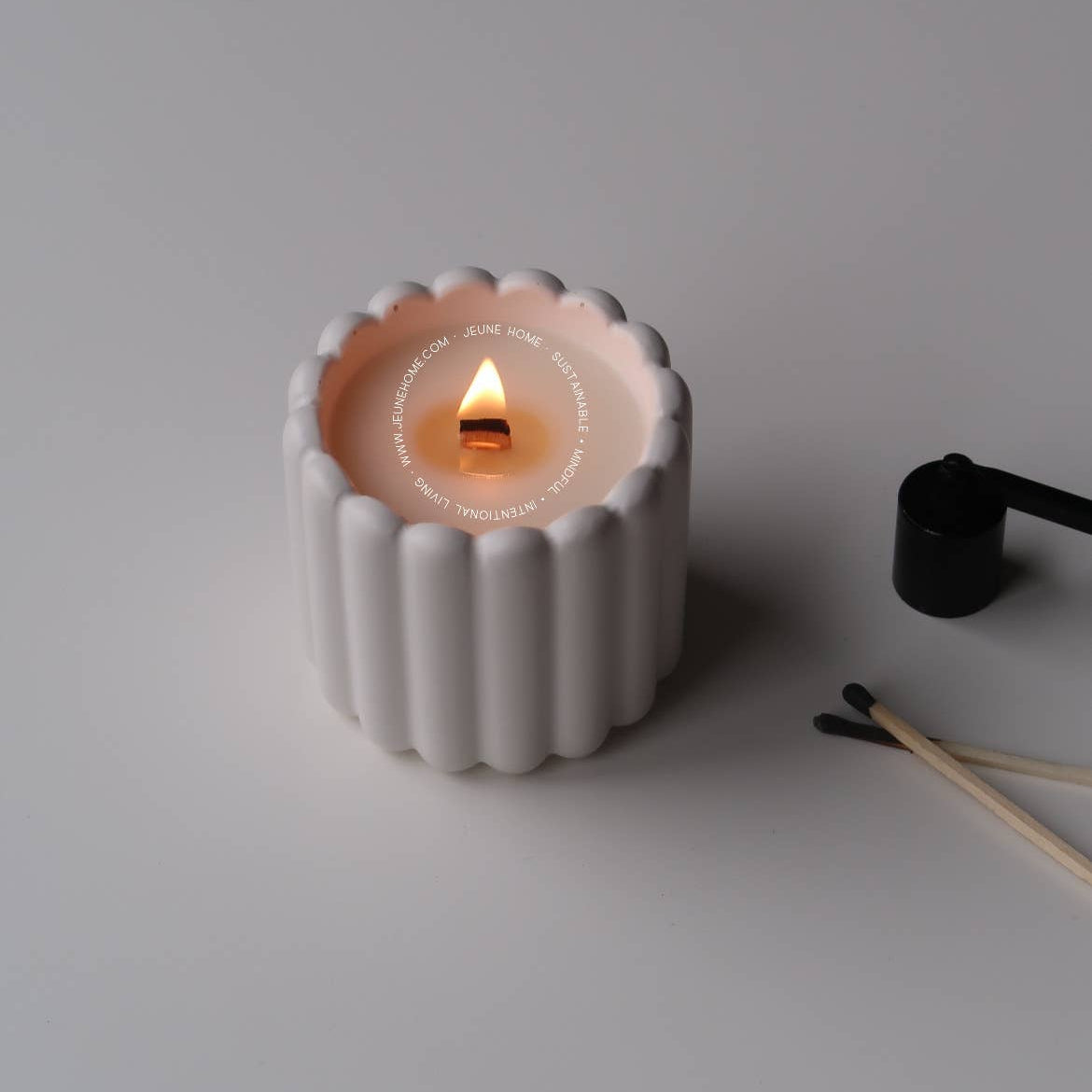 Fluted coconut wax candle in handcrafted jar